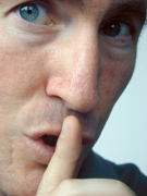 man-with-finger-to-lips